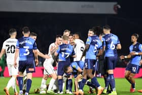 Tempers flares in both games between Dons and Wycombe at Adams Park last season
