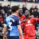 Jonathan Leko celebrates with Mo Eisa after scoring his second goal in as many games for MK Dons