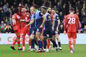 The battle between MK Dons and Wycombe was a feisty one at times on Saturday