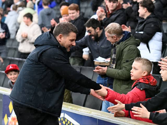Mark Jackson with young fans at Stadium MK