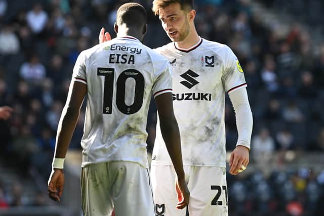 Daniel Harvie will remain a part a key part of the MK Dons dressing room in the remaining five games of the season despite missing the rest of the season through injury