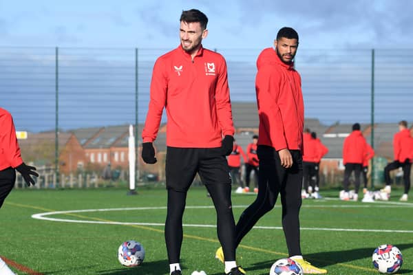 Warren O’Hora has been given the all-clear to return to full-training with MK Dons
