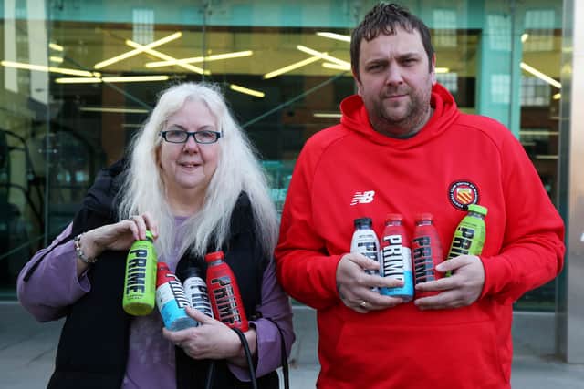 Pam Ryan, 59, and Gavin Ryan, 41, both from Manchester  are at Aldi in Ancoats, Manchester today to buy the new flavours of the viral energy drink Prime, which is limited to one flavour per customer. (SWNS)