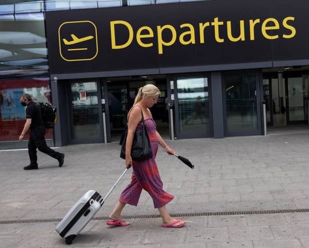 Travellers at Gatwick Airport on July 30, 2021 in London, England. (Photo by Dan Kitwood/Getty Images)