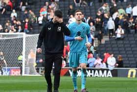 Daniel Harvie and Jamie Cumming during Dons’ ‘lap of appreciation’ on Saturday