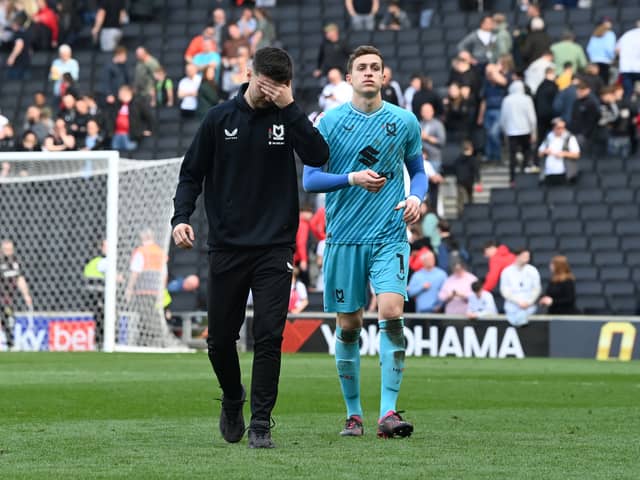 Daniel Harvie and Jamie Cumming during Dons’ ‘lap of appreciation’ on Saturday