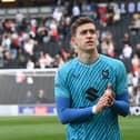 Goalkeeper Jamie Cumming believes he will return to parent club Chelsea a better player for his time with MK Dons
