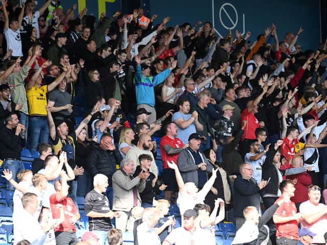 MK Dons travelling supporters will fill the away end at Burton Albion on Sunday
