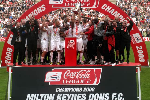 MK Dons won the League Two title in 2007/08, doing the double with the Johnstone’s Paint Trophy