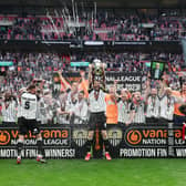 Notts County celebrating their return to the Football League with three former MK Dons in their ranks