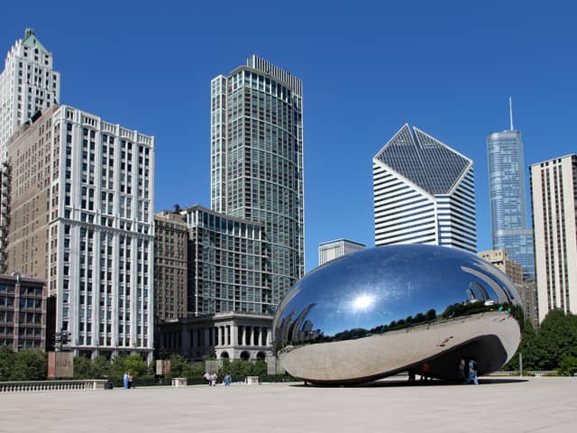 The Cloud Gate sculpture, popularly known as the bean, with Chicago's skyline