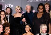 OCTOBER 13:  The team from 'This Morning' including Holly Willoughby, Phillip Schofield and Rochelle Humes, with the Best Daytime award for 'This Morning', in the winners' room at the National Television Awards 2022 at OVO Arena Wembley on October 13, 2022 in London, England. (Photo by Gareth Cattermole/Getty Images)