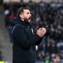 Bradley Johnson took charge of MK Dons in ridiculous circumstances back in December