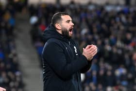 Bradley Johnson took charge of MK Dons in ridiculous circumstances back in December