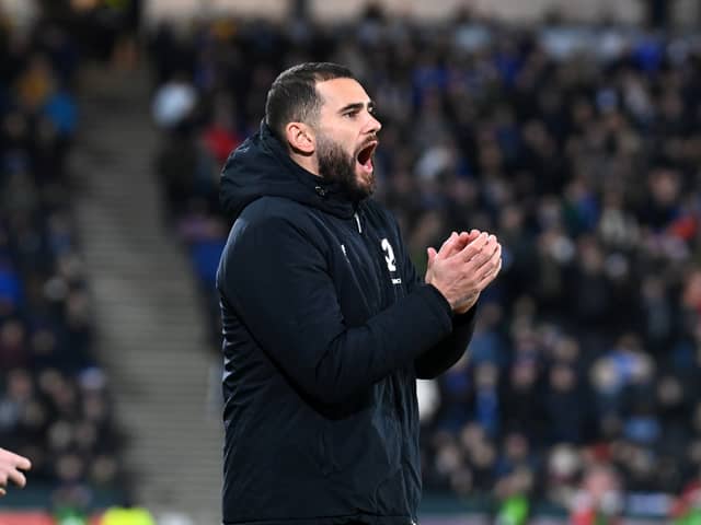 Bradley Johnson took charge of MK Dons in ridiculous circumstances back in December