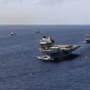HMS Queen Elizabeth: How many have Covid on Navy flagship - and where is the Carrier Strike Group now? (Photo: PA)