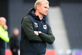 Liam Manning was involved in relegation scraps with both MK Dons and Oxford United last season