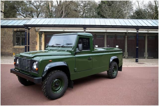 The Land Rover Defender that will be used to transport the coffin of Britain's Prince Philip, Duke of Edinburgh during the funeral procession is parked in Windsor Castle (Photo by STEVE PARSONS/POOL/AFP via Getty Images)