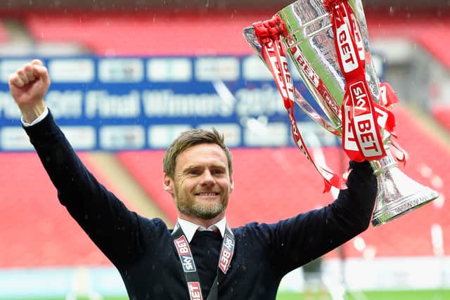 Alexander secured promotion from League Two via the play-offs with Fleetwood in 2014