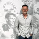 Graham Alexander spoke of his ties to Milton Keynes and making his family proud by taking over at MK Dons