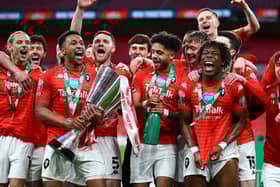 Salford City celebrated winning the EFL Trophy behind-closed-doors almost a year after reaching the final