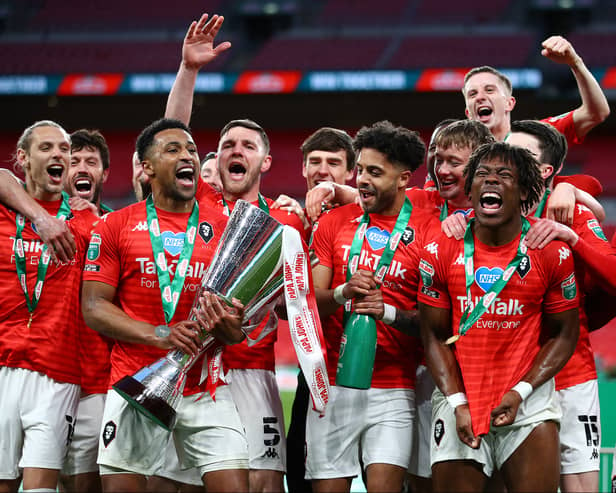 Salford City celebrated winning the EFL Trophy behind-closed-doors almost a year after reaching the final