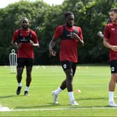 Matt Dennis, Brooklyn Ilunga and Nathan Holland will be keen to impress new boss Graham Alexander to earn a spot in his side. Pic: Jane Russell