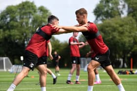 The MK Dons players will be put through their paces during the pre-season training camp in Germany next week. Pic: Jane Russell