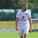 Former Ipswich and Colchester defender Tommy Smith was given a run-out for MK Dons on Saturday at Barnet. Pic: Jane Russell