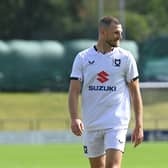Former Ipswich and Colchester defender Tommy Smith was given a run-out for MK Dons on Saturday at Barnet. Pic: Jane Russell