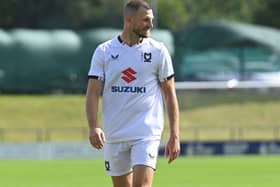 Former Ipswich and Colchester defender Tommy Smith was given a run-out for MK Dons on Saturday at Barnet. Pic: Jane Russell