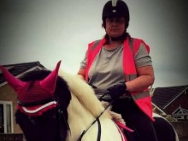 Michelle Hanney pictured riding a horse. (DWP/SWNS)