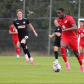 Jonathan Leko in action for MK Dons against VfL Osnabrück
