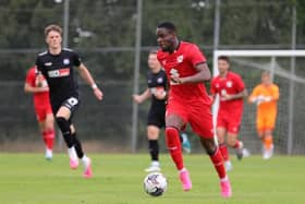 Jonathan Leko in action for MK Dons against VfL Osnabrück