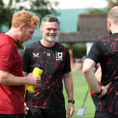 Graham Alexander is pleased by what he has seen from his MK Dons squad while out in Germany this week
