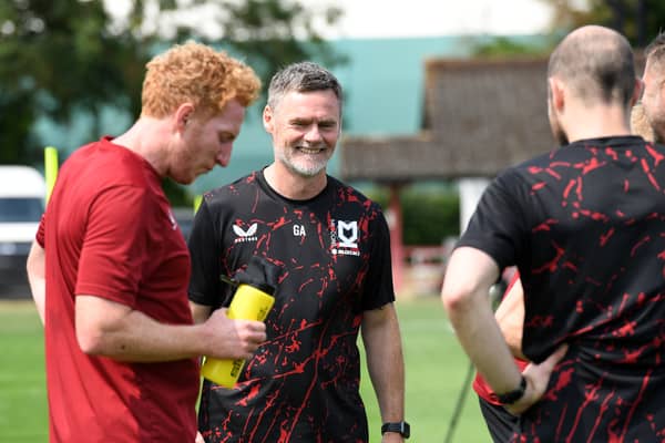 Graham Alexander is pleased by what he has seen from his MK Dons squad while out in Germany this week