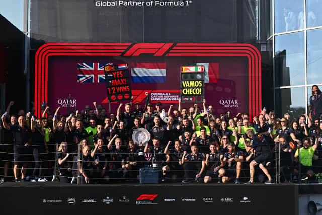 The Red Bull Racing team celebrate on the podium in Hungary. Pic: Getty