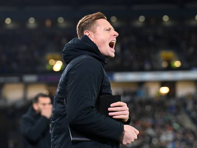 David Martin spent more time on the sidelines as coach and assistant manager than he did playing for MK Dons in this third spell at the club last season. Pic: Jane Russell