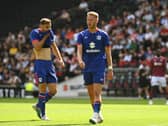 Cameron Norman and Warren O’Hora in pre-season action for MK Dons. Pic: Jane Russell