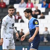 Daniel Harvie and Joe Jacobson during the match between MK Dons and Wycombe Wanderers at Stadium MK last season. Pic: Jane Russell