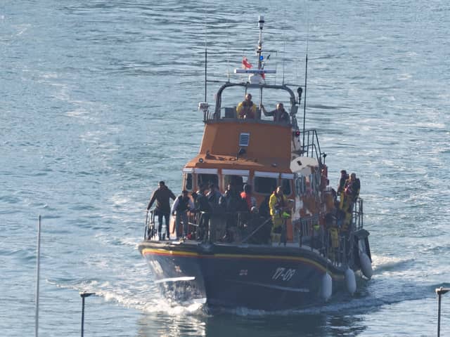 Over 50 people have been rescued after a migrant boat sunk in the Channel on Saturday morning