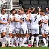 MK Dons celebrate Mo Eisa’s goal against Tranmere Rovers on Saturday