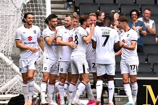 MK Dons celebrate Mo Eisa’s goal against Tranmere Rovers on Saturday