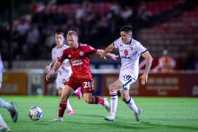 MK Dons’ Irish midfielder Dawson Devoy got his first minutes of the season in the 2-1 defeat to Crawley Town on Tuesday night. Pic: Eva Gilbert