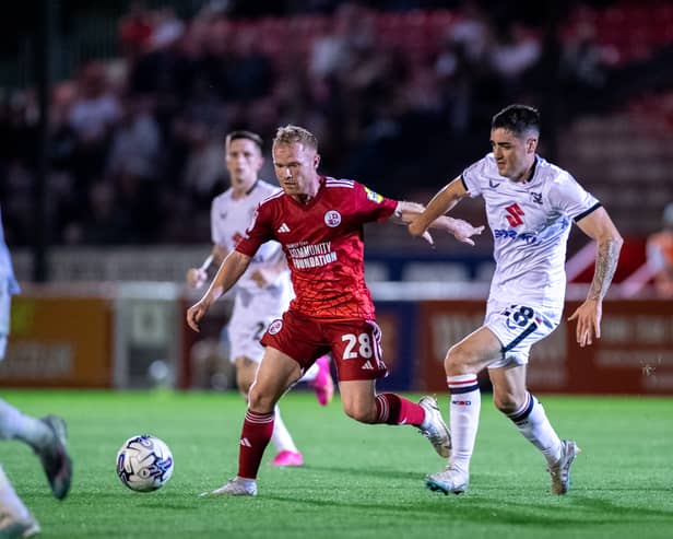 MK Dons’ Irish midfielder Dawson Devoy got his first minutes of the season in the 2-1 defeat to Crawley Town on Tuesday night. Pic: Eva Gilbert