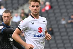 MK Dons defender Jack Tucker has been linked with a move to Barnsley