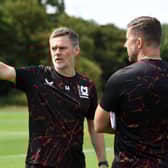 Graham Alexander and assistant Chris Lucketti are eager to get back on the training ground this week. Pic: Jane Russell