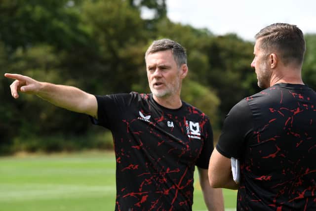 Graham Alexander and assistant Chris Lucketti are eager to get back on the training ground this week. Pic: Jane Russell