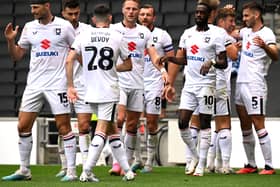 MK Dons celebrate Warren O’Hora’s second goal at Stadium MK