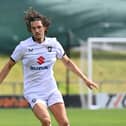 MJ Williams returned to action for MK Dons on Saturday against Doncaster Rovers